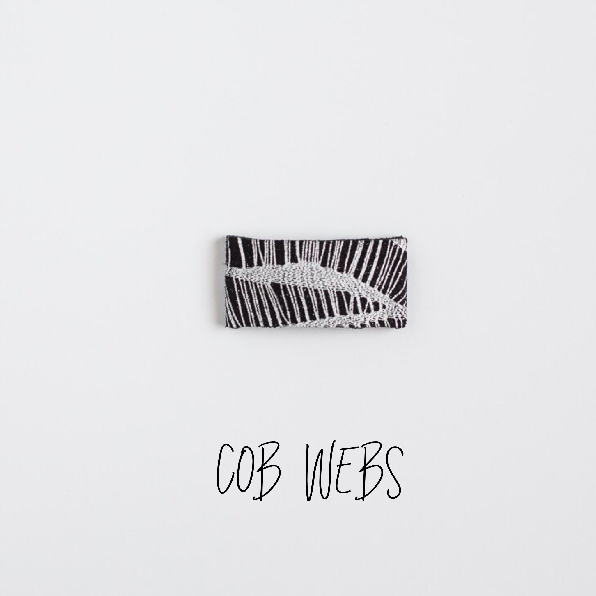 Cobwebs Leather Snap Clip