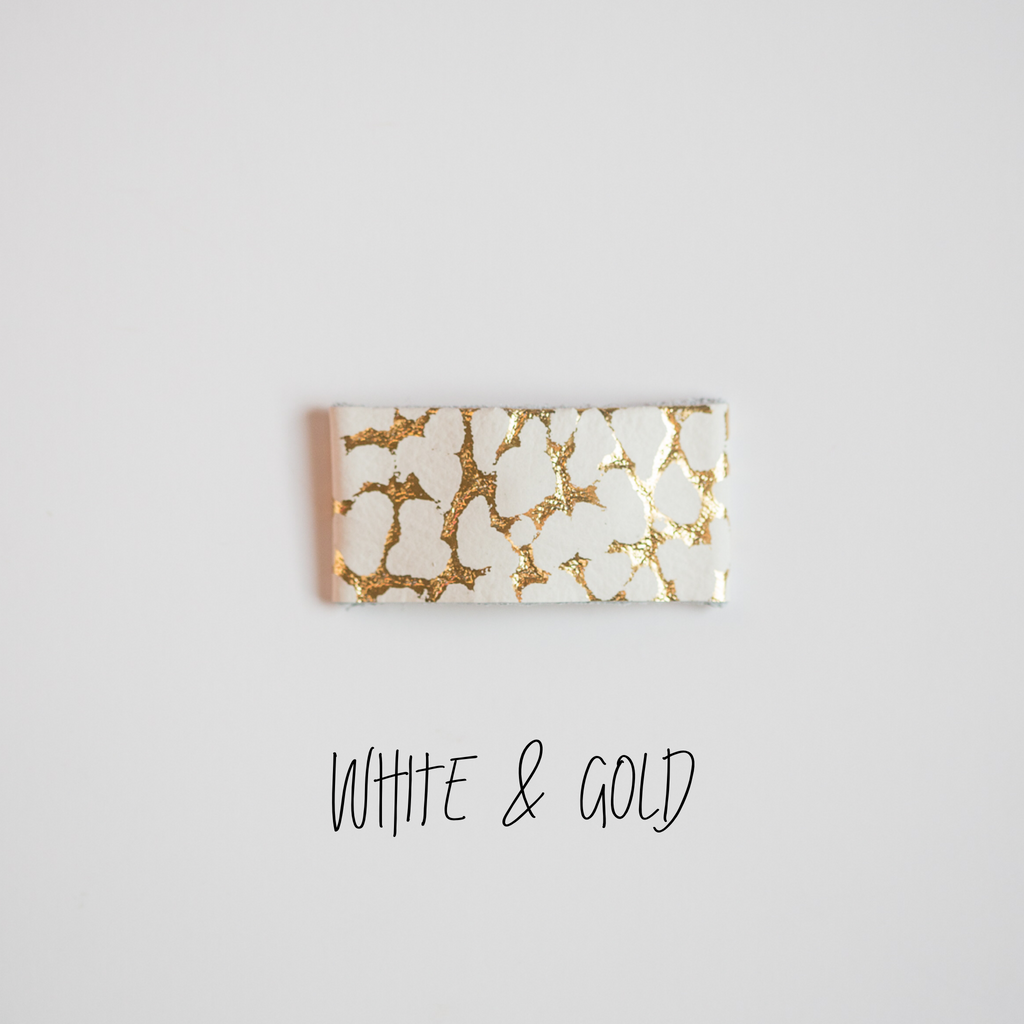White & Gold Leather Snap Clip