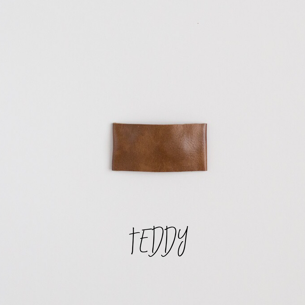 Teddy Faux Leather Snap Clip
