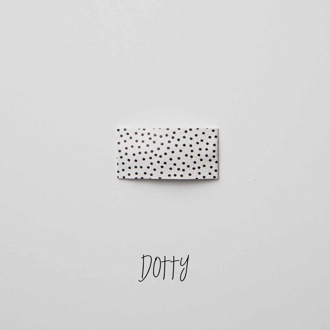 Dotty Faux Leather Printed Snap Clip